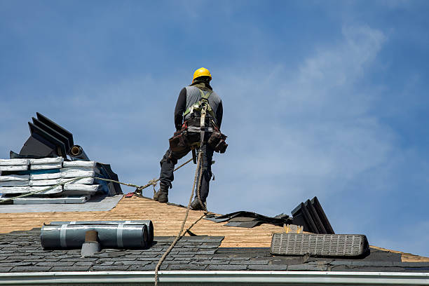 Professional Roof Replacement technician working in Center, ND
